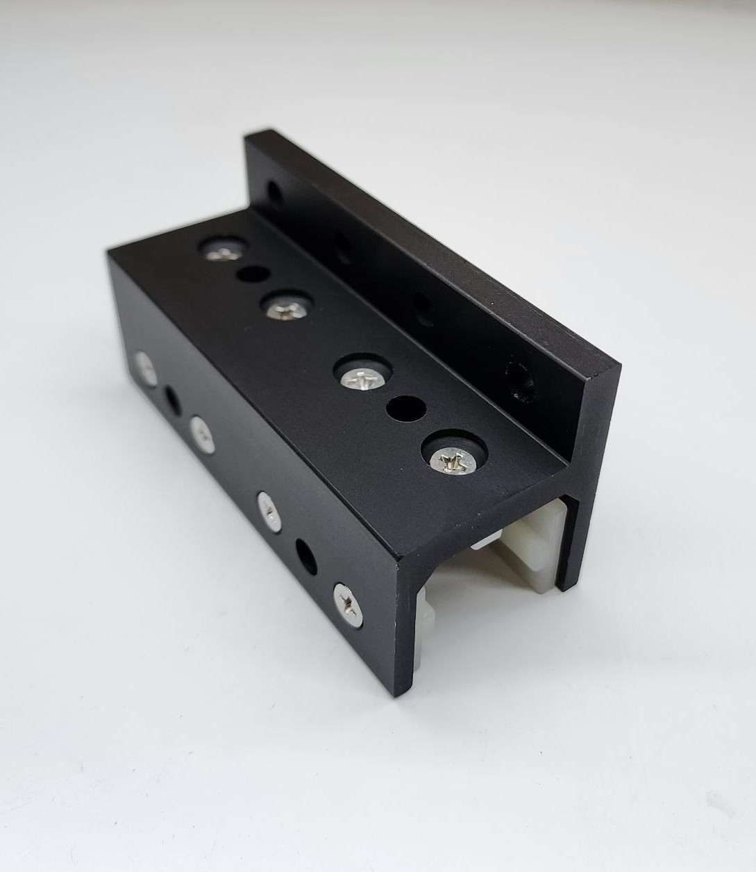 10 Series 3 Slot Mount - Single Flange Long Standard Linear Bearing for 1" wide extrusions with brake holes - black anodized
